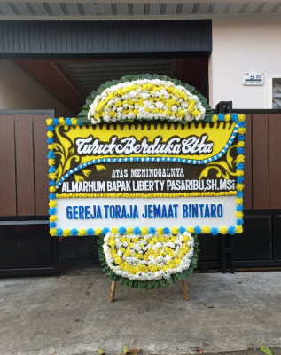 Papan Bunga Duka di Janten