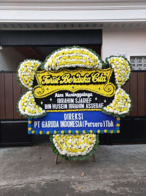 Papan Bunga Duka di Janten